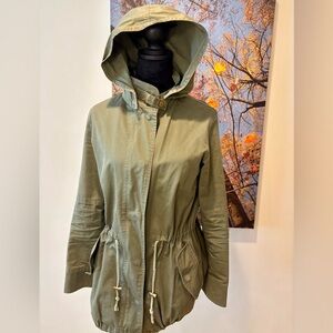 Army green lightweight coat with hood and cinch able waist